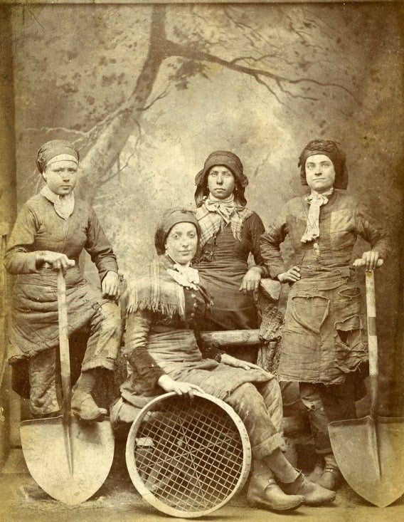 Pit Brow Women posing for a picture with the equipment they used