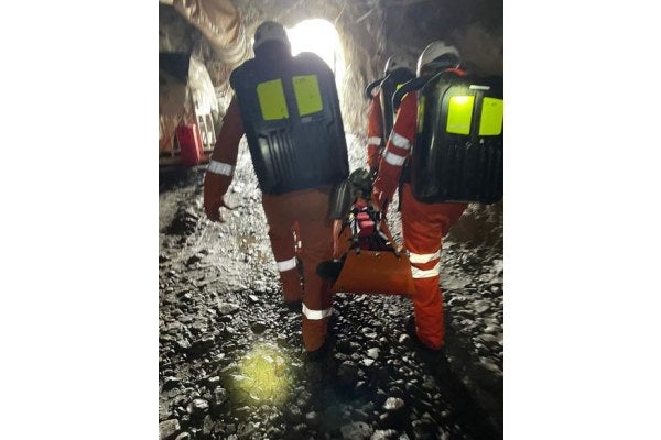 Team exiting the mine after a successful rescue