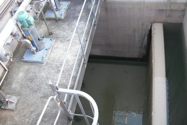 Vertical ladders are used to access concrete pits