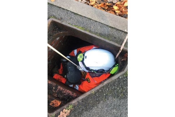 MRS Operative attempts self rescue out of a narrow Victorian manhole