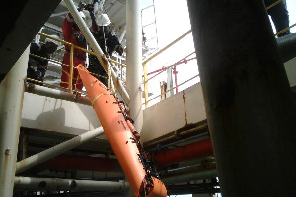 Mock emergency rescue exercise with Modec employees on the FPSO