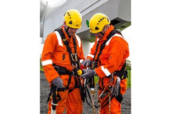 Two men completing harness safety Training