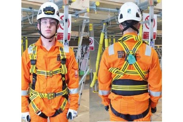 Two men wearing safety work wear and harness