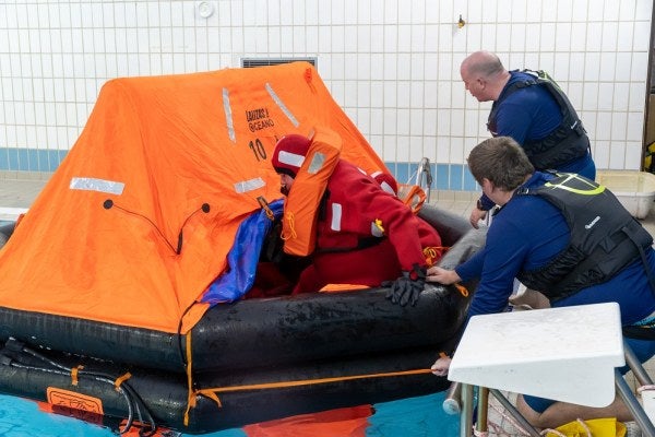 Training sessions, and someone learning how to access a life raft on water