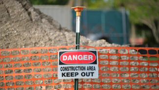Protective barrier at a construction site for safety restrictions free to use from Canva