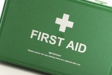 A green First Aid Kit box 