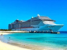 Cruise liner docked at a beach